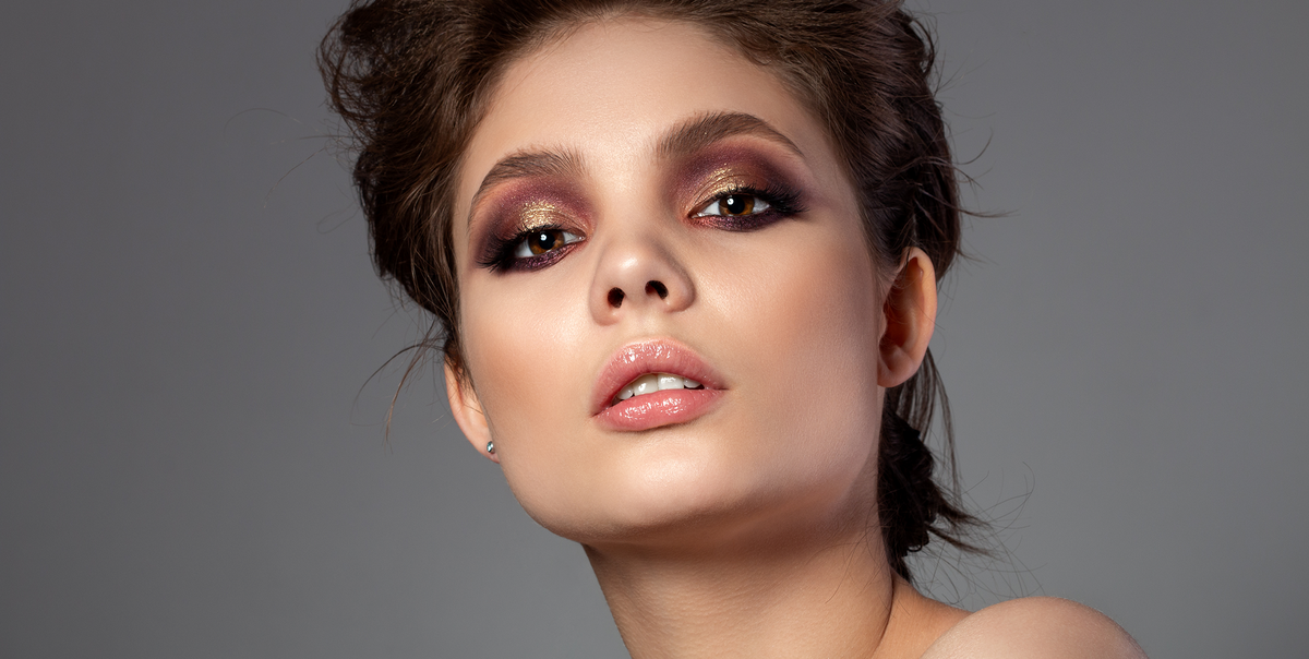 Woman with a stunning rose gold metallic smoky eye makeup look